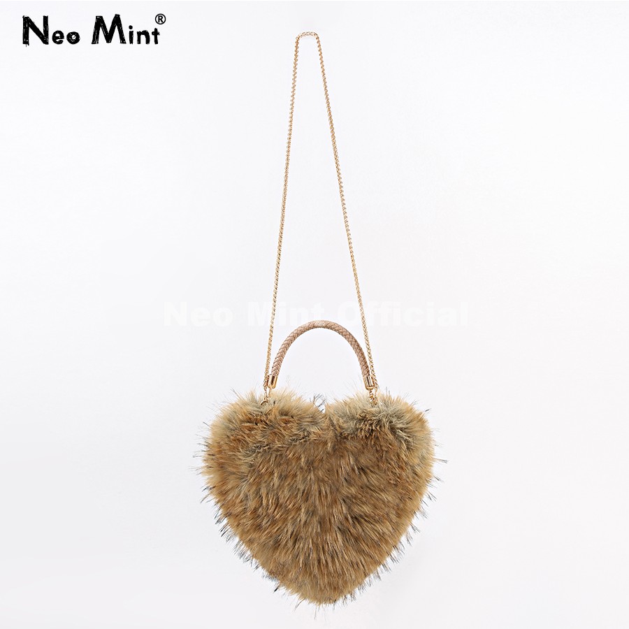 กระเป๋าถือรูปหัวใจขนแรคคูนเทีย - Women Bags Ru บทวิจารณ์และราคา